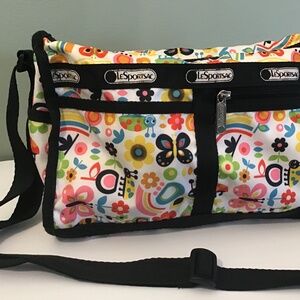 LeSportsac Shoulder Bag with small cosmetics bag.